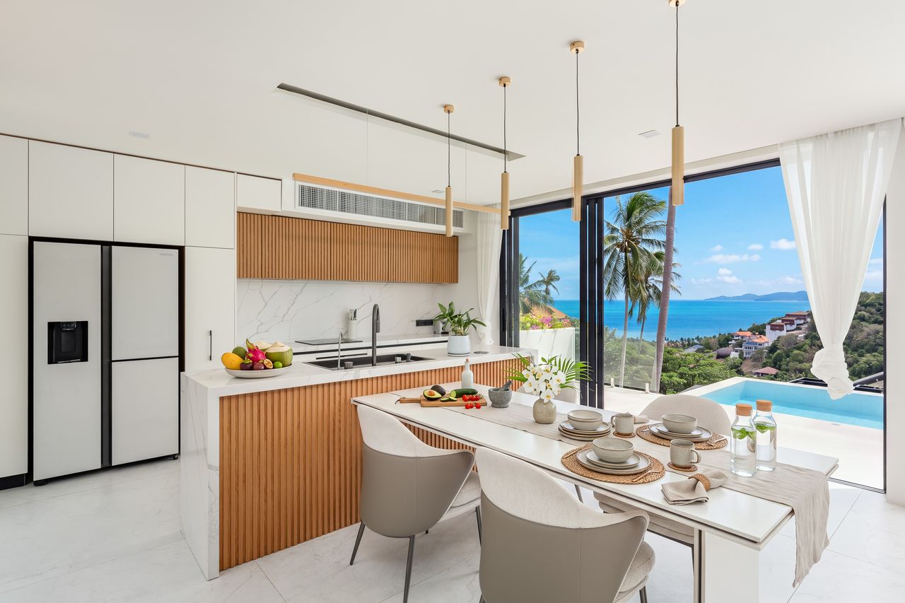Kitchen and dining table with a view of the sea