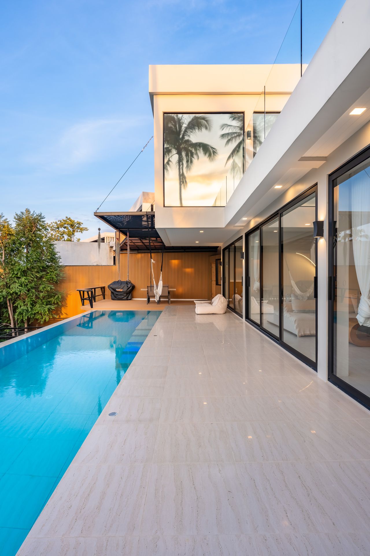 The long pool alongside the house